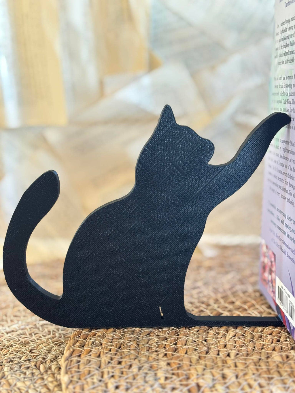 Katt bokstøtte